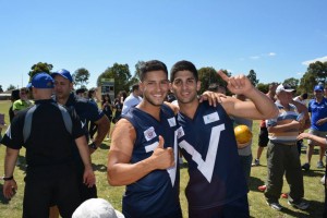 Haddad (left) and Gitani (right) celebrate after the siren. 